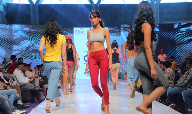 Person examining blue fabric